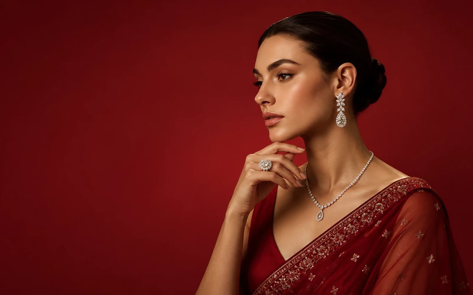 Model wearing a diamond neckset, earrings and ring from R M Gold