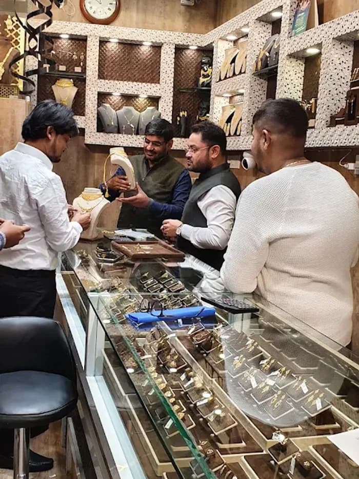 Customers at the R M Gold showroom counter on Park Street